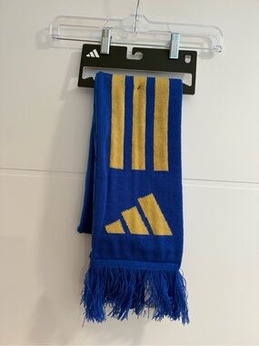 This is an Adidas Italy 26 scarf in Bold Blue and Hazy Beige
